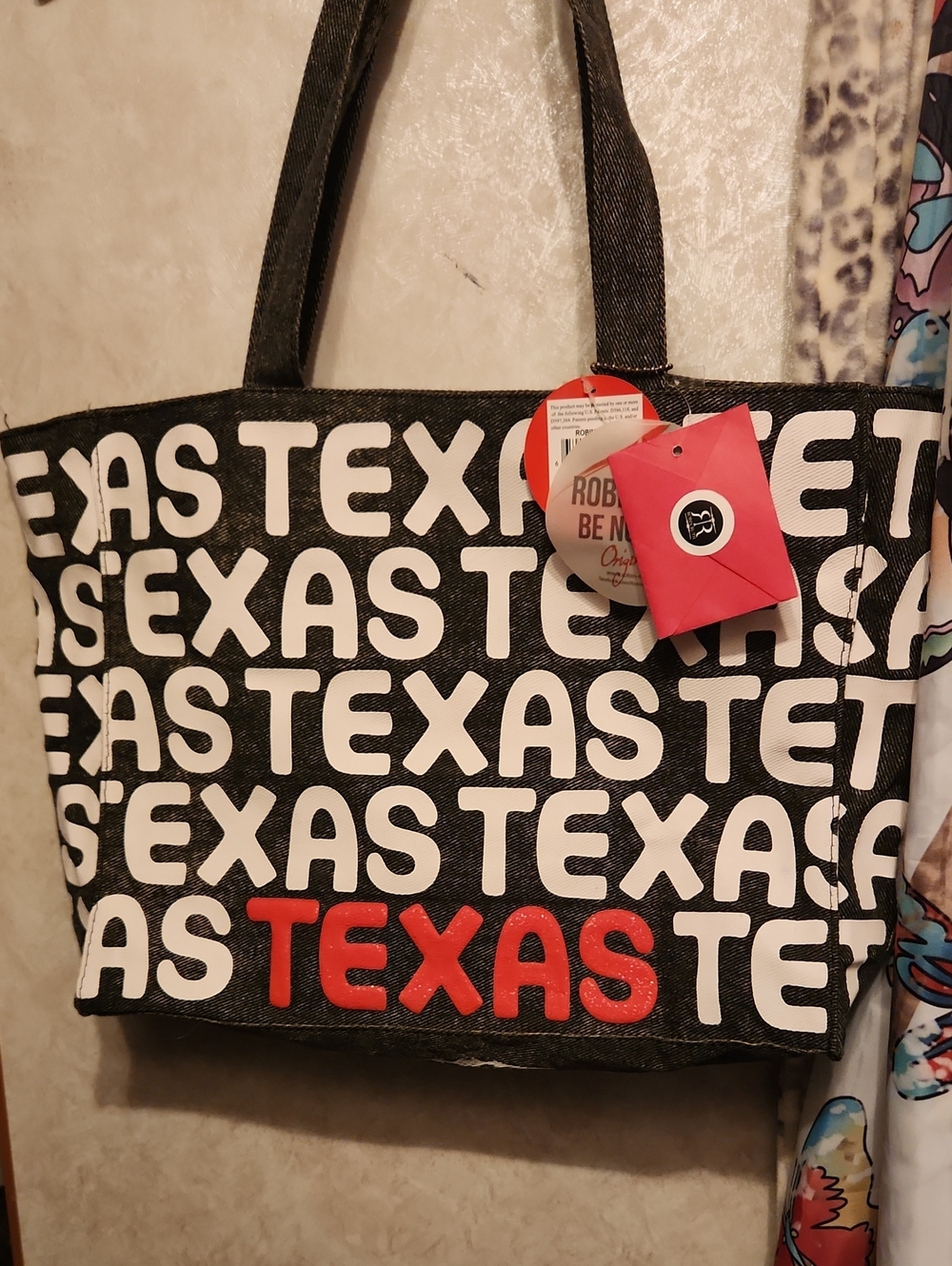 State Pride Black Tote with White Repeat TEXAS Print and Red Accent